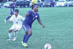 Purnell Swett runs past Scotland