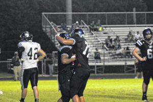 McKoy and Johnson help carry Scots past Rams