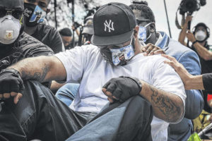 On the spot where George Floyd died, his brother urges calm