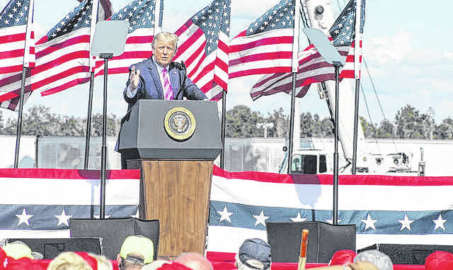 125887459_web1_Trump