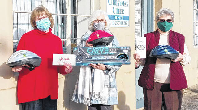 126175496_web1_Pilot
JJ Melton | The Laurinburg Exchange
Barbara Mack, Brenda Grubbs and Beth Newbold represented the Scottish Pilot Club on Thursday and provided donations for Christmas Cheer.