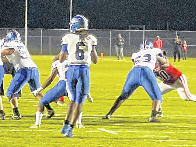 Senior Mandrell Johnson drops back to pass Friday night against New Bern.
                                 Brian North of WCTI-TV | Courtesy Photo