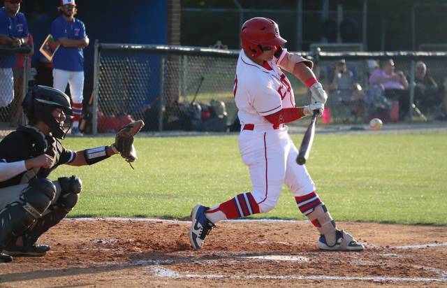 Sophomore Alex Hatcher (10) puts a ball in play Wednesday night against Porter Ridge.
                                 Neel Madhavan | Laurinburg Exchange