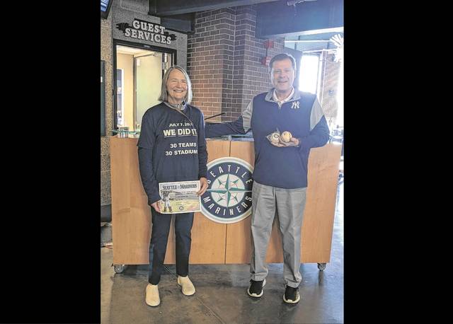 Ellen S. Jordan, Ph.D., and Randy Jordan commemorate the conclusion of their ballpark journey at T-Mobile Park in Seattle where the Mariners hosted the Yankees.
