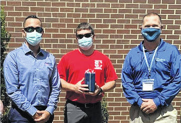 Courtesy photo
Scotland County Parks and Recreation Recreation Coordinator Jeff Maley was given safety recognition for all the work he does to keep Scotland County playgrounds and parks safe for the community. Maley is in the middle with Parks and Recreation Director Bryan Graham on the left and Chief Inspector Thomas Milligan on the right.