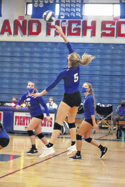 <p>Senior Kate Carter spikes the ball for a kill Tuesday against Southern Lee.</p>
<p>Neel Madhavan | Laurinburg Exchange</p>