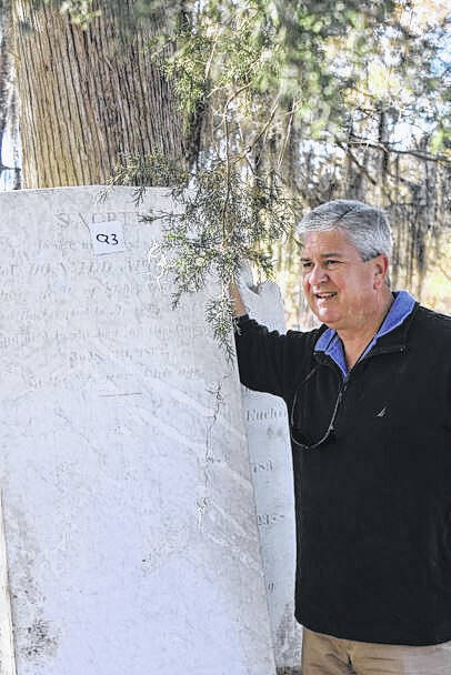 JJ Melton | The Laurinburg Exchange
                                Local Historian Bill Caudill stood beside a tombstone at Stewartsville Cemetery after it had just been dug out of the ground and moved. The headstone was extra special to Caudill because it belongs to his fifth great-grandparents.