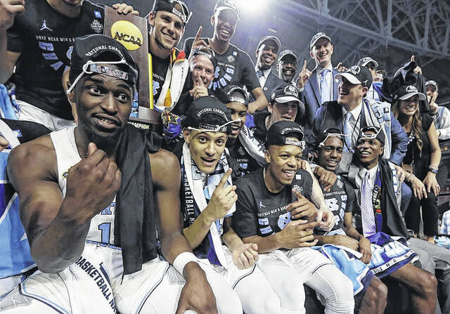 AP Photo | David J. Phillip
                                North Carolina players celebrate with the trophy after the championship game against Gonzaga at the Final Four NCAA college basketball tournament, April 3, 2017, in Glendale, Ariz. This years Final Four is either unprecedented or pretty close. North Carolina is making a record 21st appearance in the Final Four, Saturday, April 2, 2022.