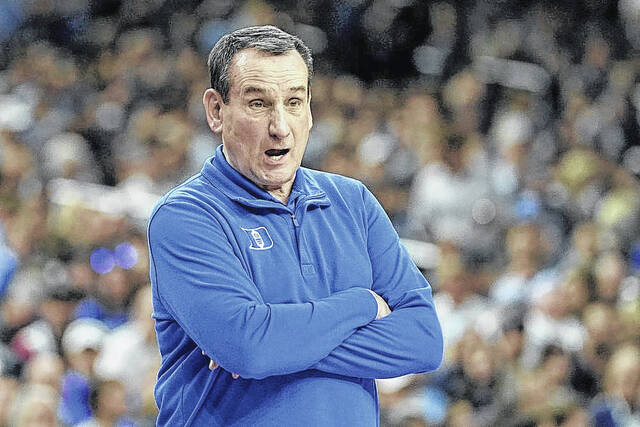 128379034_web1_APdukedefeat
AP Photo | David J. Phillip
Duke head coach Mike Krzyzewski watches during the first half of a college basketball game in the semifinal round of the Mens Final Four NCAA tournament, Saturday, April 2, 2022, in New Orleans.