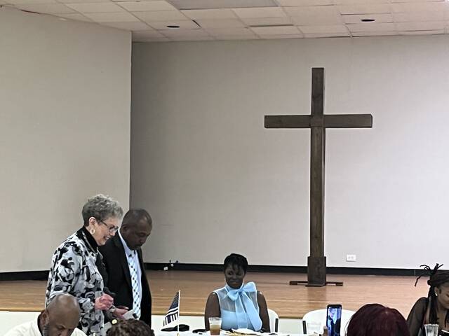 128507868_web1_IMG_1204
Darwin Duke Williams escorts his seventh-grade teacher, Jane Summerville to the podium at his retirement dinner on Thursday evening.
Cheris Hodges/Laurinburg Exchange