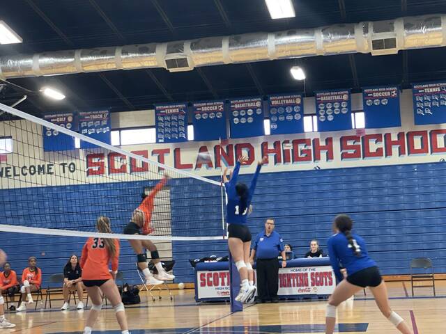 128829545_web1_thumbnail_Image--39-
Two Lady Scots players (blue) block a spike attempt by a South View player (orange).
Photo| Brandon Hodge/ The Laurinburg Exchange