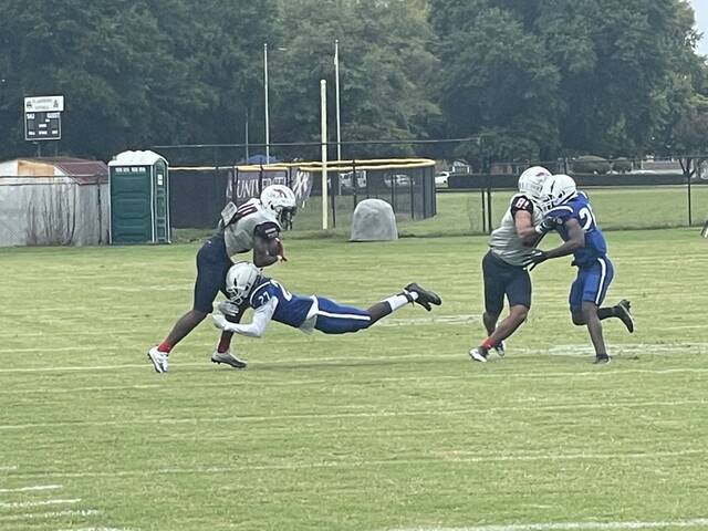<p>Knights defensive back Kaison Rhea makes a tackle on a Patriots player in Saturday’s home opener.</p>
<p>Photos| Brandon Hodge/ The Laurinburg Exchange</p>