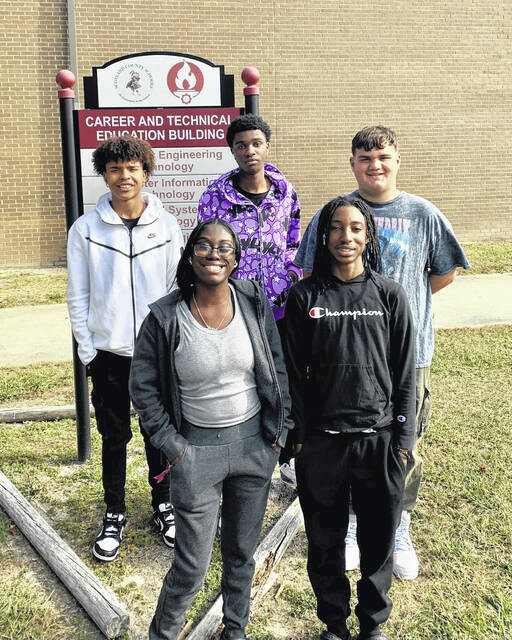 129064964_web1_thumbnail_IMG_5601
These students, KeYonnie McLean, Jazzanay Mitchell, Ronald Knight, Ethan Spangler and Ryan Quick, are the first qualified to repair HP devices in Scotland County Schools.
Photo courtesy of Scotland County Public Schools