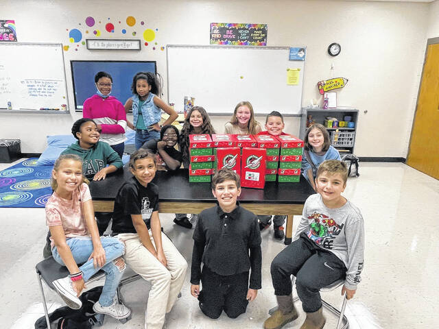 129099190_web1_South-Johnson-Beta-Club
The South Johnson Elementary School Beta Club smiles with the gifts theyre sending to Operation Christmas Child to help other kids receive presents this holiday season.
Photo courtesy of Scotland County Public Schools