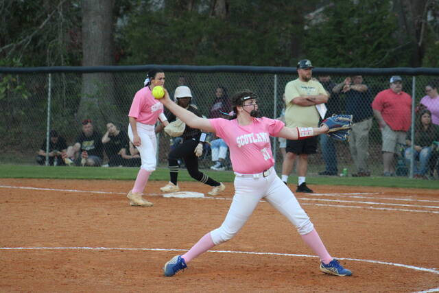 Lady Scots pitcher Avery Stutts throws a pitch during the Live Like Madison Strikeout Cancer game against Marlboro County on March 23. Stutts led the Lady Scots past the Hoke County Bucks Friday night with a rare perfect game.
                                 File photo