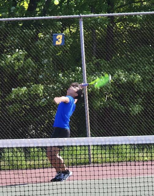 <p>Scotland’s Ricky Zhang serves the ball during Tuesday’s meet against Lee County in Sanford.</p>
<p>Contributed photos</p>