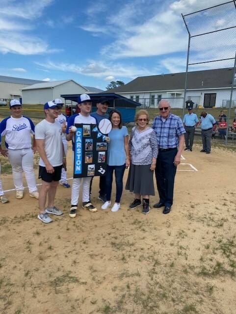 129616092_web1_download--4-
Saints senior Carston Cline takes a picture with family before Friday nights playoff game against White Plains Christian.
Contributed to the Exchange