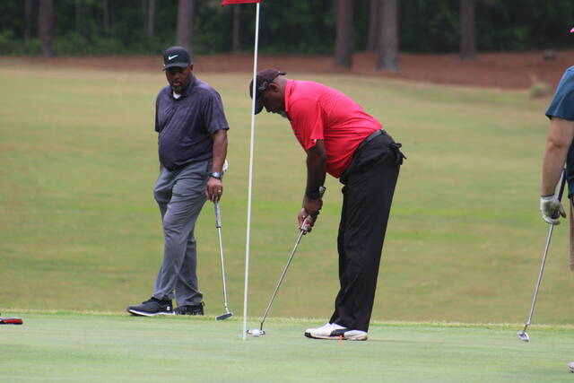 129658497_web1_IMG_1922
The Honoring Veterans Golf Tournament began Friday morning at Scotch Meadows Country Club in Laurinburg and will go on throughout the day on Saturday.
Brandon Hodge | The Laurinburg Exchange