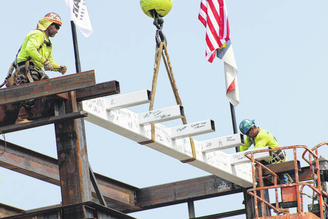 129830247_web1_IMG_0259
A topping-out ceremony was held at the construction site where Scotland Health is investing more than $45 million in expansion and renovations at the hospital. During the ceremony, a steel beam signed by those in attendance was raised and placed on the facility under construction, completing the framing phase.