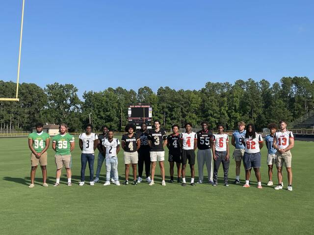 129879798_web1_thumbnail_Image--16-
Players from Sandhills Athletic Conference schools join together for a picture at the SACs media day at Hoke County High Schools Raz Autry Stadium on Sunday. Seniors Darreus McDougald and Malcom McGirt represented the Fighting Scots.
Brandon Hodge | The Laurinburg Exchange