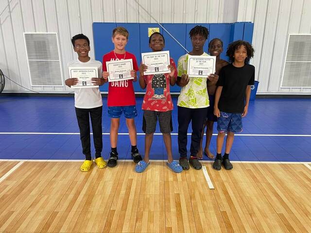Players and award winners from the Team Unified sixth grade team take a picture during the organizations end-of-the-year awards ceremony and cookout at the Wagram Recreation Center on Sunday.
                                 Contributed by Justin McNickle