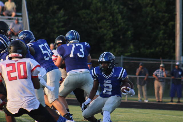Scotlands Zay Jones (2) runs with the ball during Friday nights season opener against Southern Durham at Pate Stadium.
                                 Brandon Hodge | The Laurinburg Exchange