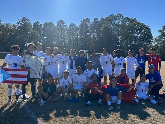130148155_web1_IMG_1480_ad_hoc
The St. Andrews mens soccer team takes a picture together. The Knights finished the season 11-6-2, their best record since 2014.
St. Andrews Athletics