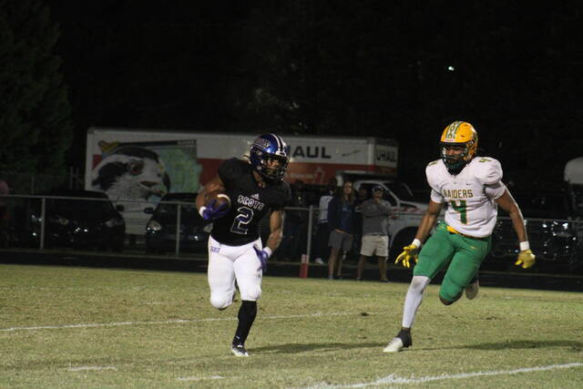 Scotlands Zay Jones (2) runs the ball during an Oct. 27 game against Richmond at Pate Stadium in Laurinburg. Jones was voted the Sandhills Athletic Conferences Offensive Player of the Year, while nine other Scots were named to the All-SAC football team.
                                 File photo