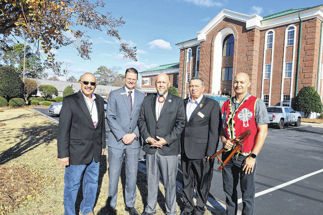 130215194_web1_IMG_5339
Shown are grant writer William Locklear, Lumbee Guaranty Bank Chief Executive Officer Kyle R. Chavis, Lumbee Tribal Chairman John L. Lowery, Lumbee Tribal Administrator Ricky Harris and Lumbee Flutist John Oxendine.
Tasha Oxendine | Lumbee Tribe