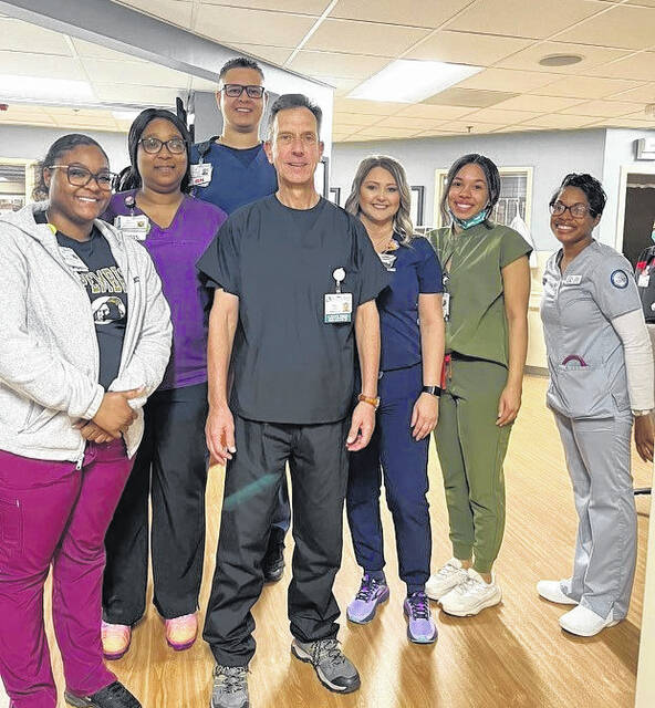 130226223_web1_Greg-Wood
Long-time CEO of Scotland Health Greg Wood is pictured in scrubs with some of the nurses he had the privilege to spend Suits in Scrubs Day with before his retirement.
Courtesy photo
