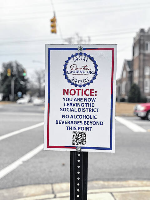 130258824_web1_thumbnail_IMG_8664
Throughout downtown Laurinburg signs now are out showing the social district boundaries, each stating you are entering and exiting the district.
Katelin Gandee | The Laurinburg Exchange
