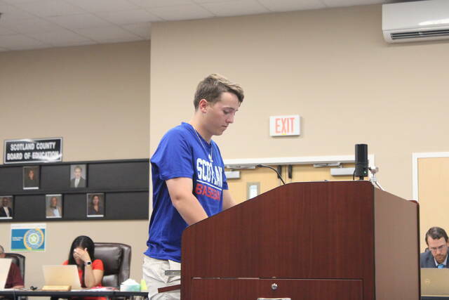 130231202_web1_129623278_web1_IMG_1741
Former Scotland baseball player Turner Bounds speaks at the podium during a Scotland County Schools Board of Education meeting at the A.B. Gibson Education Center on May 8, 2023.
File photo