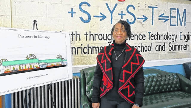 130274387_web1_Partners-1
Melba McCallum stands with a rendering of the planned Partners in Ministry facility. The wall in the background promotes one of the focuses of the after-school program: Strengthening Youth Through Science, Technology, Engineering and Math (SYSTEM)
Les High | Border Belt Independent