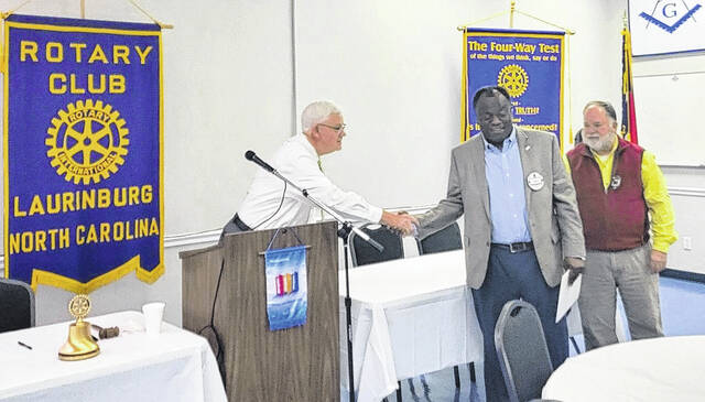 130300994_web1_thumbnail_ROTARY-INSTALLATION
Adell Baldwin, Scotland County Schools Superintendent, was recently installed as a new member of the Laurinburg Rotary Club. Participating in the installation are Danny Caddell, president; and David Harling, membership chairman. The Laurinburg Rotary Club was established in 1925 and is a service organization with the goal of doing good locally and in the world.
Courtesy photo