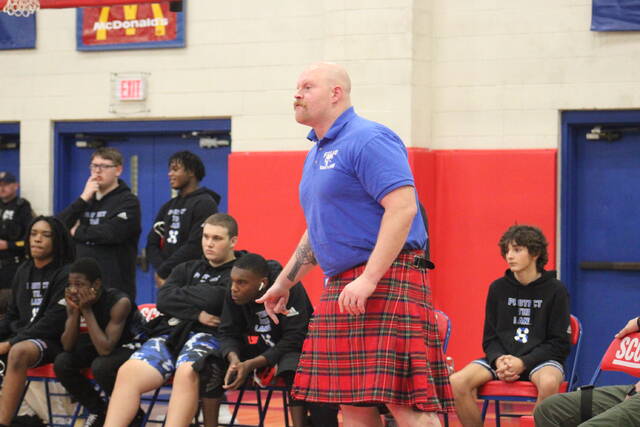 <p>Scotland’s Thomas Havener (wearing kilt) coaches a match during Thursday’s tri-meet with Montgomery Central and Marlboro County in Laurinburg.</p>
<p>Brandon Hodge | The Laurinburg Exchange</p>