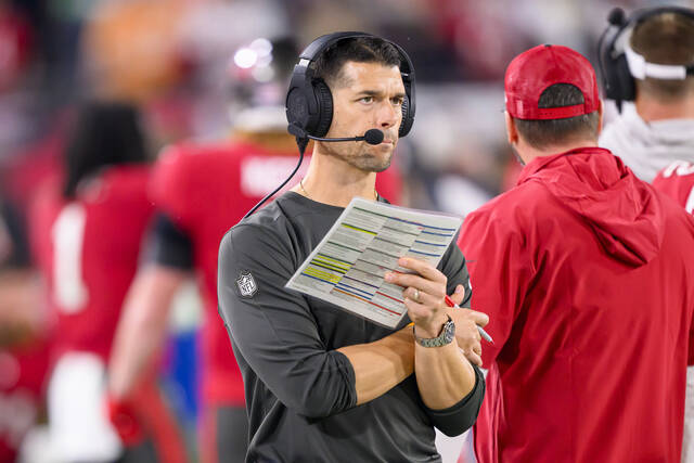 130327224_web1_130327224-2a91982df15148cfaf7364f8bc846332
Tampa Bay Buccaneers offensive coordinator Dave Canales holds the play sheet on the sidelines during an NFL wild-card playoff football game against the Philadelphia Eagles, Monday, Jan. 15, 2024 in Tampa, Fla. The Carolina Panthers have agreed to hire Tampa Bay Buccaneers offensive coordinator Dave Canales as their new head coach, according to two people familiar with the situation.
Doug Murray | AP file photo
