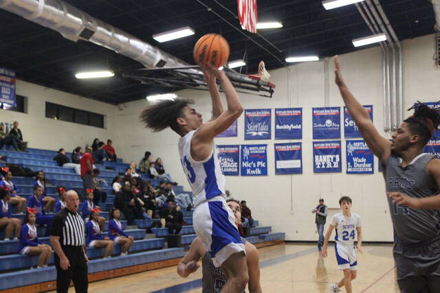 130341709_web1_IMG_8067
Scotlands Shylan Harrell (23) shoots over Purnell Swetts Darius Bethea (14) during Wednesdays game in Laurinburg.
Brandon Hodge | The Laurinburg Exchange