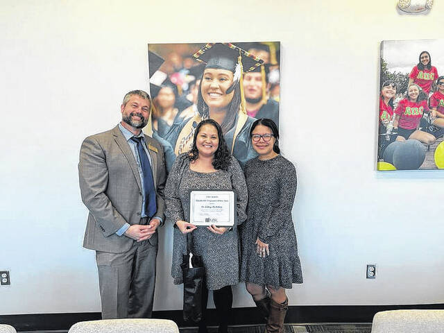 130402269_web1_McMillan_EOY
Ashley McMillan, who serves as executive director of the Curt and Catherine Locklear American Indian Heritage Center at The University of North Carolina at Pembroke, was recently named Employee of the Year at UNCP.