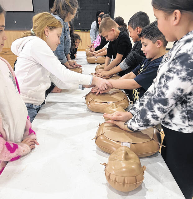 130458369_web1_IMG_0739
Children at the Pembroke Boys & Girls Club participate in lifesaving training in hands-only CPR.
Tasha Oxendine | Lumbee Tribe of NC