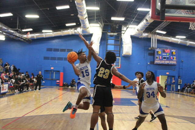 130463778_web1_IMG_7341
Scotlands Jaiquez Caldwell (15) attempts a shot during a Dec. 9, 2023, game against Marlboro County in Laurinburg.
File photo