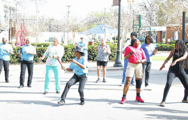 130465281_web1_IMG_1909
Warm, sunny weather brought out swarms of people to the Festival of the Arts held Saturday from noon to 6 p.m. in downtown Laurinburg. The festival featured music, dancers, cheerleaders, and artisans selling homemade wares like tablecloths and runners, woodwork items, and jewelry. Vendors also sold inflatable toys, t-shirts, hats, and more. Food trucks offered everything from turkey legs, BBQ, and fried fish to gourmet funnel cakes and ice cream. There was also a gaming truck.
Stephanie Walcott | For the Exchange