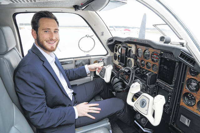 Seth Hatchell, who earned a Master of Business Administration (MBA) degree from The University of North Carolina at Pembroke in 2023, is following his passion for flying as executive director of the Laurinburg-Maxton Airport in Scotland County.
                                 Courtesy photo