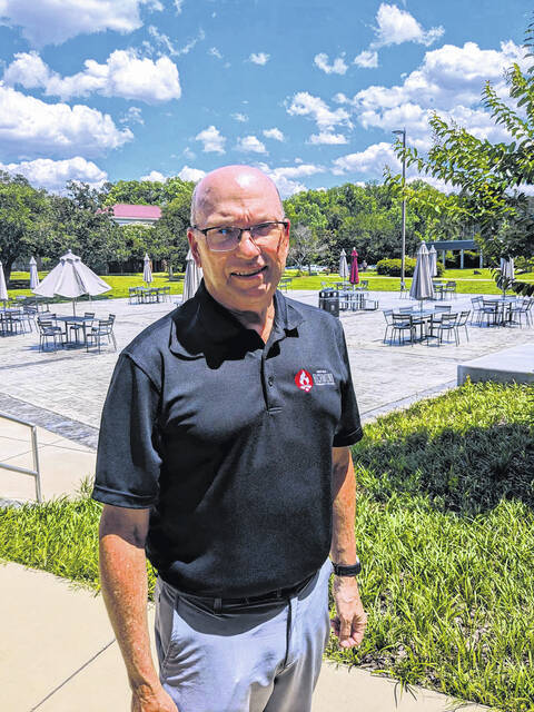 130652272_web1_Dale-McInnis_05.29.24
Dale McInnis stands by the patio in front of the RichmondCC Café, one of the many developments he spearheaded while president of Richmond Community College. McInnis will retire in October after 14 years as president.