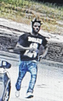 130737179_web1_Shooter
Laurinburg Police Department investigators viewed camera footage in the area and identified a shooter suspect as a Black male wearing a black t-shirt, acid-washed jeans and white shoes.
Courtesy photo | LPD