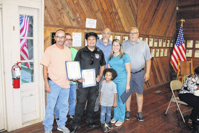 130919166_web1_IMG_2914
The mayor of Gibson Archie Herring on behalf of the town presented certificates to members of the Gibson first responders for their response to a child choking on a piece of candy during a church service.
Tomeka Sinclair | The Laurinburg Exchange