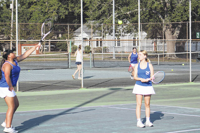 <p>Freshman Danyah Norton (left) and Sophomore Mickenna Bristow (right) compete in doubles action on Thursday afternoon in Laurinburg. </p>
<p>Andrew Smolar | The Laurinburg Exchange</p>