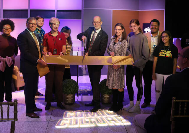 131033332_web1_Mass_Comm_Ribbon_Cutting_236283-mx--1-
Mass Communication Department Chair Terence Dollard cuts the ceremonial ribbon on completing upgrades to the television studio as Chancellor Robin Gary Cummings, Provost Diane Prusank, Jamie Litty, Sallyann Clark and Mass Communication students look on.