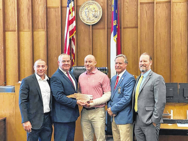 131033714_web1_Danny-Britt
Shown are District Attorney Matt Scott, Robeson County; Charles Spahos, General Counsel and Legislative Liaison, NCCDA; Senator Danny Britt, Jr., NC-24; District Attorney Mike Hardin, Hoke and Moore County; and District Attorney Jon David, Bladen, Brunswick and Columbus County.