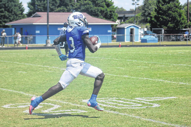 131138004_web1_IMG_0402
Scotland senior Dajuan Gibson earned a spot on the Shrine Bowl of the Carolinas roster as a replacement for Brian Rowe on Thursday afternoon. Here, Gibson rushes into the endzone for a 54-yard touchdown during the first half of Scotlands home opener against Terry Sanford back on Aug. 31.
File Photo