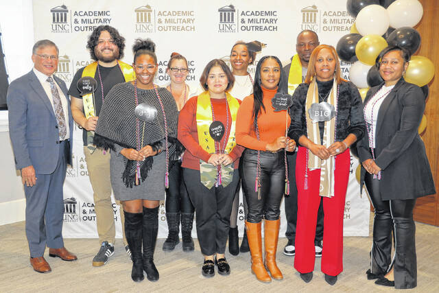 131140151_web1_Military_Affiliated_Graduation_Ceremony_265830A
Several students were recently recognized during a special ceremony for UNCPs military-affiliated graduates. Students were treated to a luncheon and later presented with red, white and blue honor cords.
Courtesy photo | UNCP